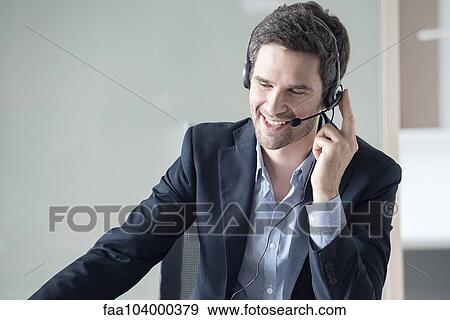 Businessman on phone call View Large Photo Image Stock Photo - Businessman on phone call. Fotosearch
