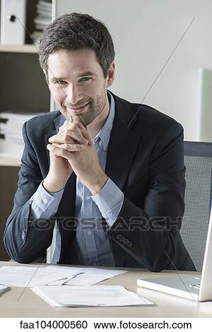 Stock Image - Businessman, portrait. Fotosearch