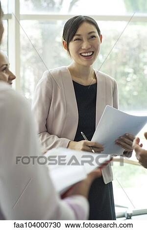 Businesswoman at the office View Large Photo Image Stock Image - Businesswoman at the office. Fotosearch
