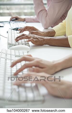 Call center operators must be fast typists View Large Photo Image Stock Photo - Call center operators must be fast typists. Fotosearch