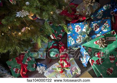Christmas gifts under Christmas tree View Large Photo Image Stock Image - Christmas gifts under Christmas tree. Fotosearch
