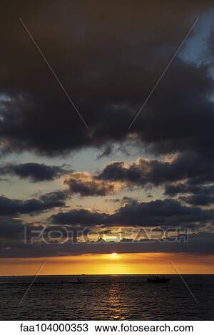 Cloudy sky over sea during sunset View Large Photo Image Stock Image - Cloudy sky over sea during sunset. Fotosearch