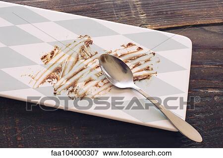 Empty dessert plate smeared with chocolate View Large Photo Image Stock Photo - Empty dessert plate smeared with chocolate. Fotosearch