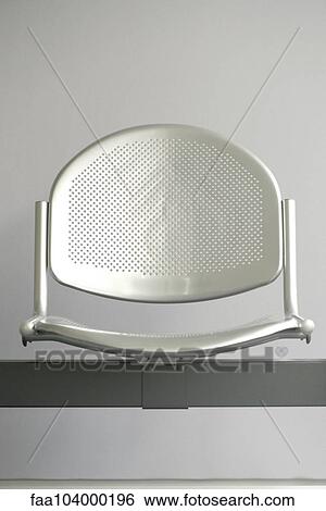 Stock Photograph - Empty waiting room chair. Fotosearch