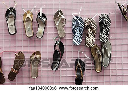 Stock Photograph - Flipflops for sale. Fotosearch