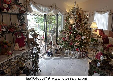 Home interior heavily decorated for Christmas View Large Photo Image Stock Photo - Home interior heavily decorated for Christmas. Fotosearch