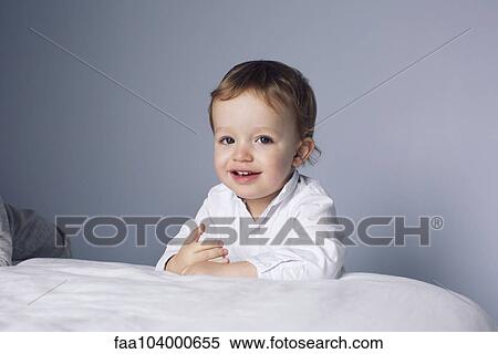 Little boy smiling, portrait View Large Photo Image Stock Photography - Little boy smiling, portrait. Fotosearch