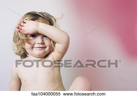 Little girl holding arm over face, portrait View Large Photo Image Stock Photography - Little girl holding arm over face, portrait. Fotosearch