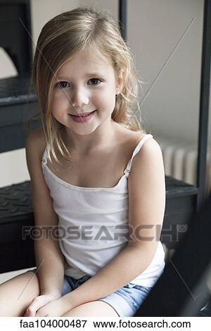 Stock Photo - Little girl, portrait. Fotosearch