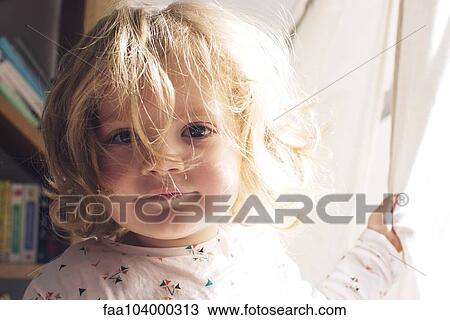 Little girl with messy hair, portrait View Large Photo Image Stock Image - Little girl with messy hair, portrait. Fotosearch