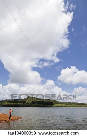 Man fishing on mountain lake View Large Photo Image Stock Photo - Man fishing on mountain lake. Fotosearch