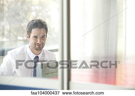 Office worker at work in office View Large Photo Image Stock Photo - Office worker at work in office. Fotosearch