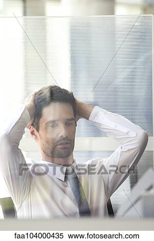 Office worker relaxing in office View Large Photo Image Stock Photography - Office worker relaxing in office. Fotosearch