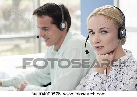 Operator in call center, portrait View Large Photo Image Stock Photograph - Operator in call center, portrait. Fotosearch