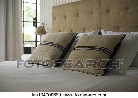 Pillows on bed View Large Photo Image Stock Photo - Pillows on bed. Fotosearch