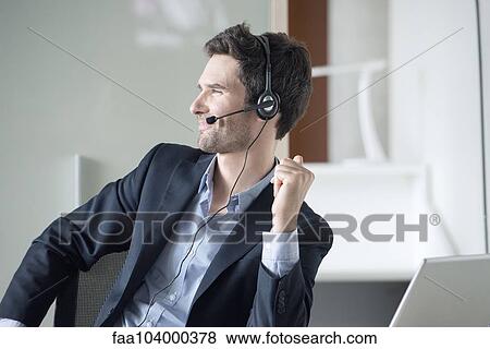Stock Photo - Salesman on phone call. Fotosearch