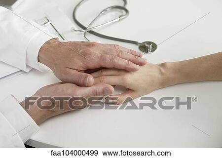 Sexual harrassment in healthcare workplace View Large Photo Image Stock Photo - Sexual harrassment in healthcare workplace. Fotosearch