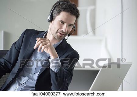 Telemarketer making pitch View Large Photo Image Stock Photo - Telemarketer making pitch. Fotosearch