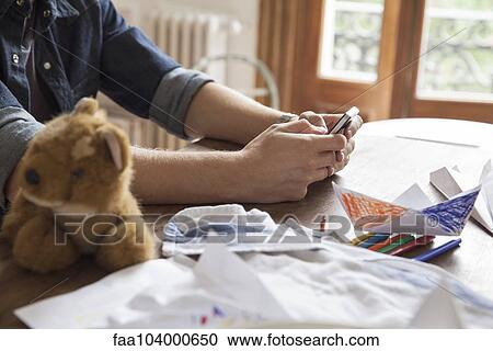 Using smartphone View Large Photo Image Stock Image - Using smartphone. Fotosearch