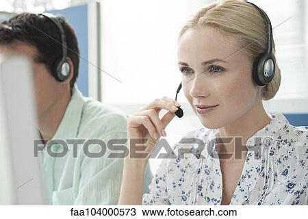 Woman working in call center View Large Photo Image Stock Image - Woman working in call center. Fotosearch