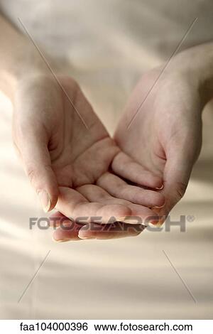 Woman's cupped hands, close-up View Large Photo Image Stock Photograph - Woman's cupped hands, close-up. Fotosearch