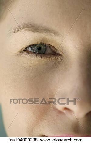 Stock Photo - Woman's face, close-up. Fotosearch