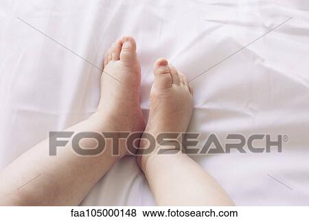 Baby's bare feet View Large Photo Image Stock Photo - Baby's bare feet. Fotosearch