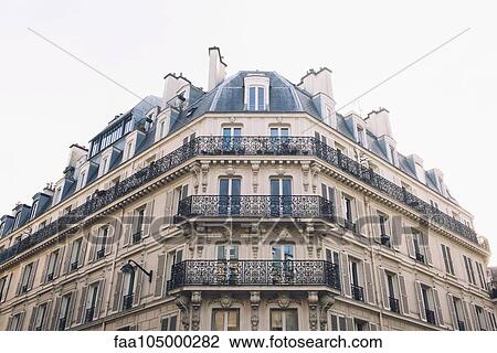 Balconies lining apartment building facade View Large Photo Image Stock Image - Balconies lining apartment building facade. Fotosearch