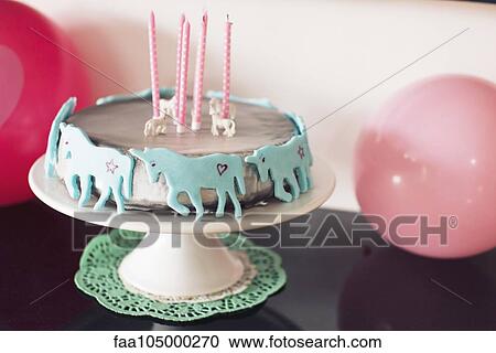 Birthday cake decorated with unicorns View Large Photo Image Stock Image - Birthday cake decorated with unicorns. Fotosearch