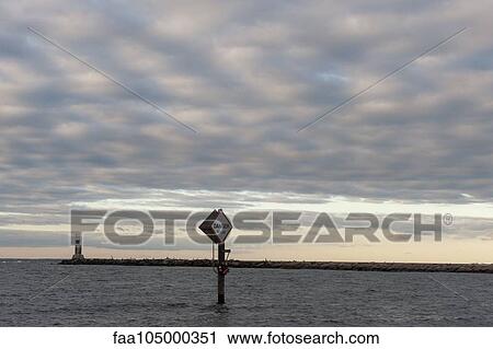 Bouy warning of jetty in sea View Large Photo Image Stock Image - Bouy warning of jetty in sea. Fotosearch