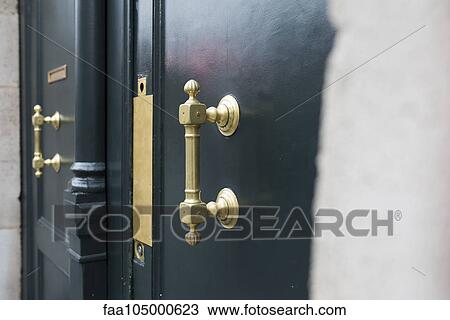 Brass handle on door View Large Photo Image Stock Image - Brass handle on door. Fotosearch