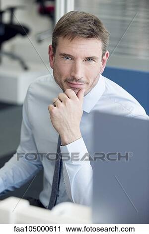 Businessman at work, portrait View Large Photo Image Stock Image - Businessman at work, portrait. Fotosearch