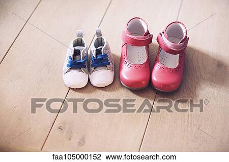 Children's shoes side by side on floor View Large Photo Image Stock Image - Children's shoes side by side on floor. Fotosearch