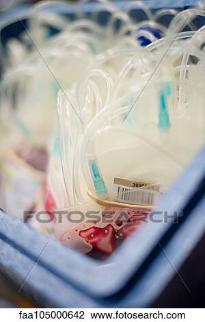 Stock Image - Close-up of blood bags in container. Fotosearch