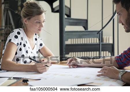Picture - Collaborating on design project. Fotosearch