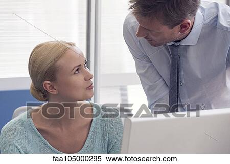 Colleauges chatting View Large Photo Image Stock Photography - Colleauges chatting. Fotosearch