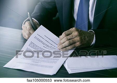 Executive signing document View Large Photo Image Stock Image - Executive signing document. Fotosearch