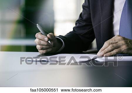 Executive writing letter by hand View Large Photo Image Stock Image - Executive writing letter by hand. Fotosearch