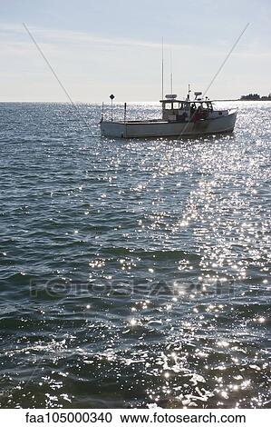 Fishing boat in water View Large Photo Image Stock Image - Fishing boat in water. Fotosearch