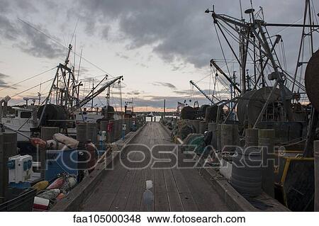 Fishing boats along dock View Large Photo Image Stock Photo - Fishing boats along dock. Fotosearch