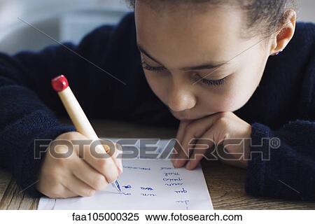 Girl doing homework View Large Photo Image Stock Photography - Girl doing homework. Fotosearch