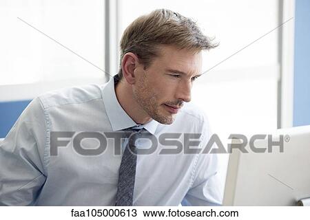 Graphic designer concentrating on project View Large Photo Image Stock Image - Graphic designer concentrating on project. Fotosearch