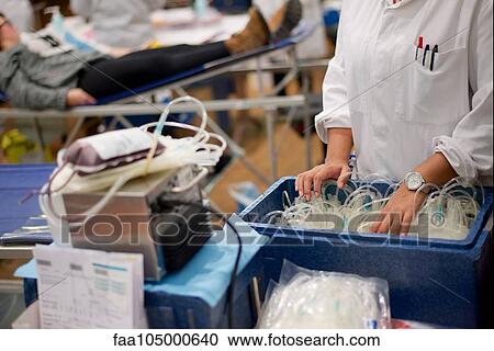 Healthcare worker sorting bags of blood, cropped View Large Photo Image Stock Image - Healthcare worker sorting bags of blood, cropped. Fotosearch