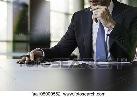 Lawyer preparing to write letter by hand View Large Photo Image Stock Image - Lawyer preparing to write letter by hand. Fotosearch