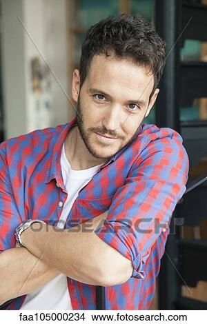 Man with arms folded, portrait View Large Photo Image Picture - Man with arms folded, portrait. Fotosearch