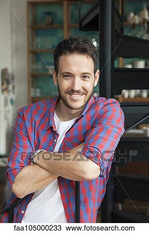 Man with arms folded, portrait View Large Photo Image Stock Image - Man with arms folded, portrait. Fotosearch
