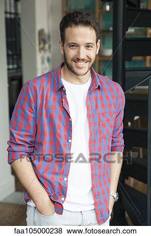 Man with hands in pockets, portrait View Large Photo Image Stock Photo - Man with hands in pockets, portrait. Fotosearch