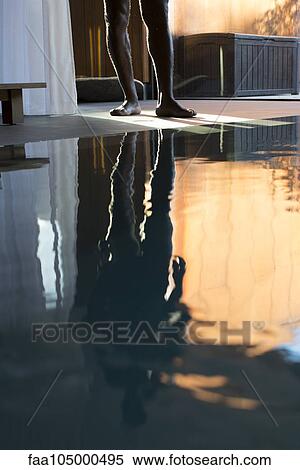 Man's reflection on spa swimming pool, low section View Large Photo Image Stock Photography - Man's reflection on spa swimming pool, low section. Fotosearch
