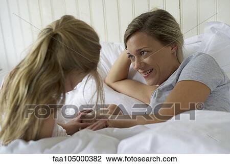 Stock Image - Mother and daugther bonding. Fotosearch