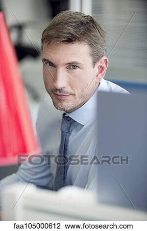 Office worker busy at work View Large Photo Image Stock Image - Office worker busy at work. Fotosearch